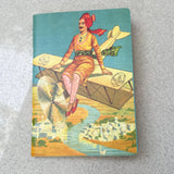 Man Seated on Biplane Notebook